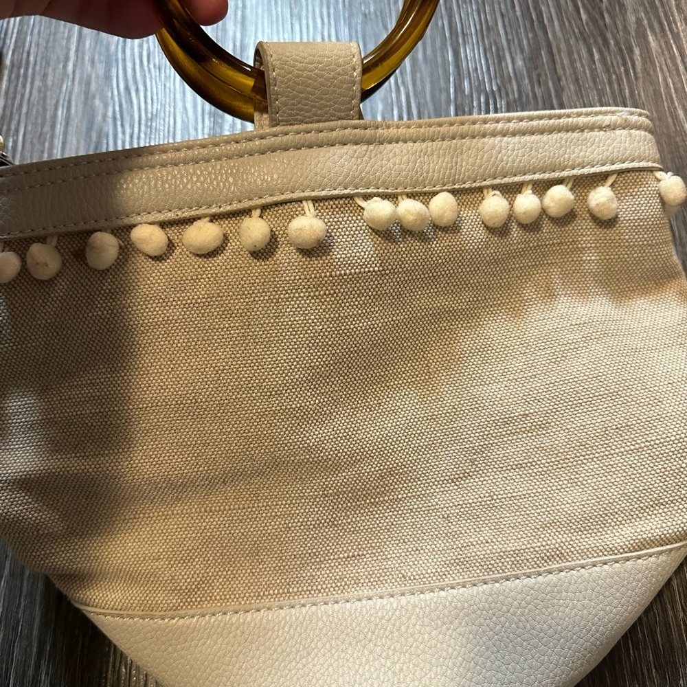 Shiraleah Tortoise Handle Pom Pom Mini Bucket Tote Linen/Cream - Picture 4 of 4